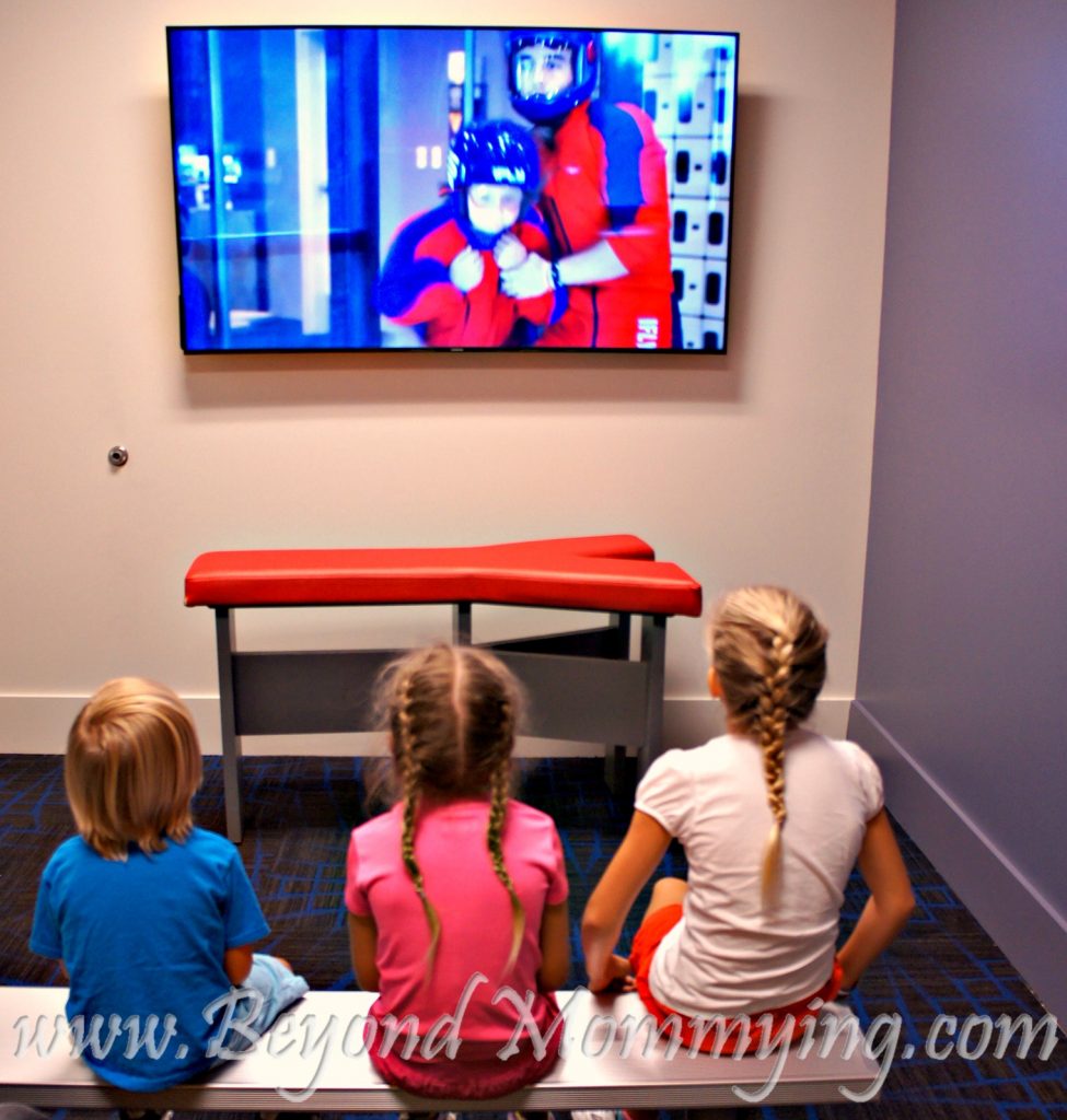 Kids going through the safety presentation before flying at iFLY Fort Lauderdale