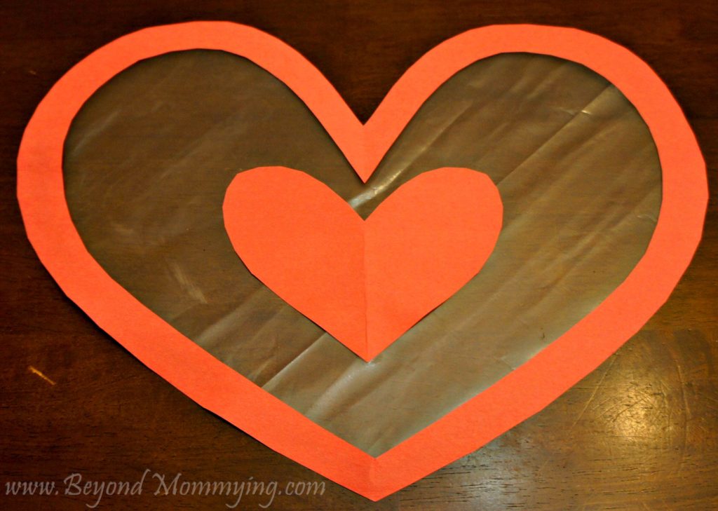 Easy preschool Valentine's Day Craft card using tissue and contact paper. Easy Valentine's card for toddlers and young children to make.