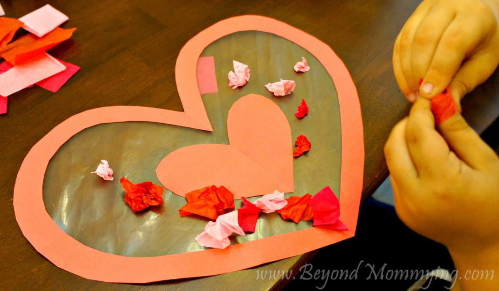Easy preschool Valentine's Day Craft card using tissue and contact paper. Easy Valentine's card for toddlers and young children to make.